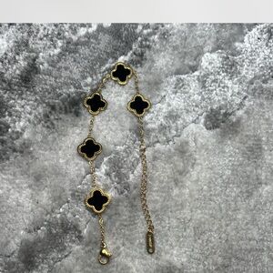 Elegant Black and Gold Bracelet